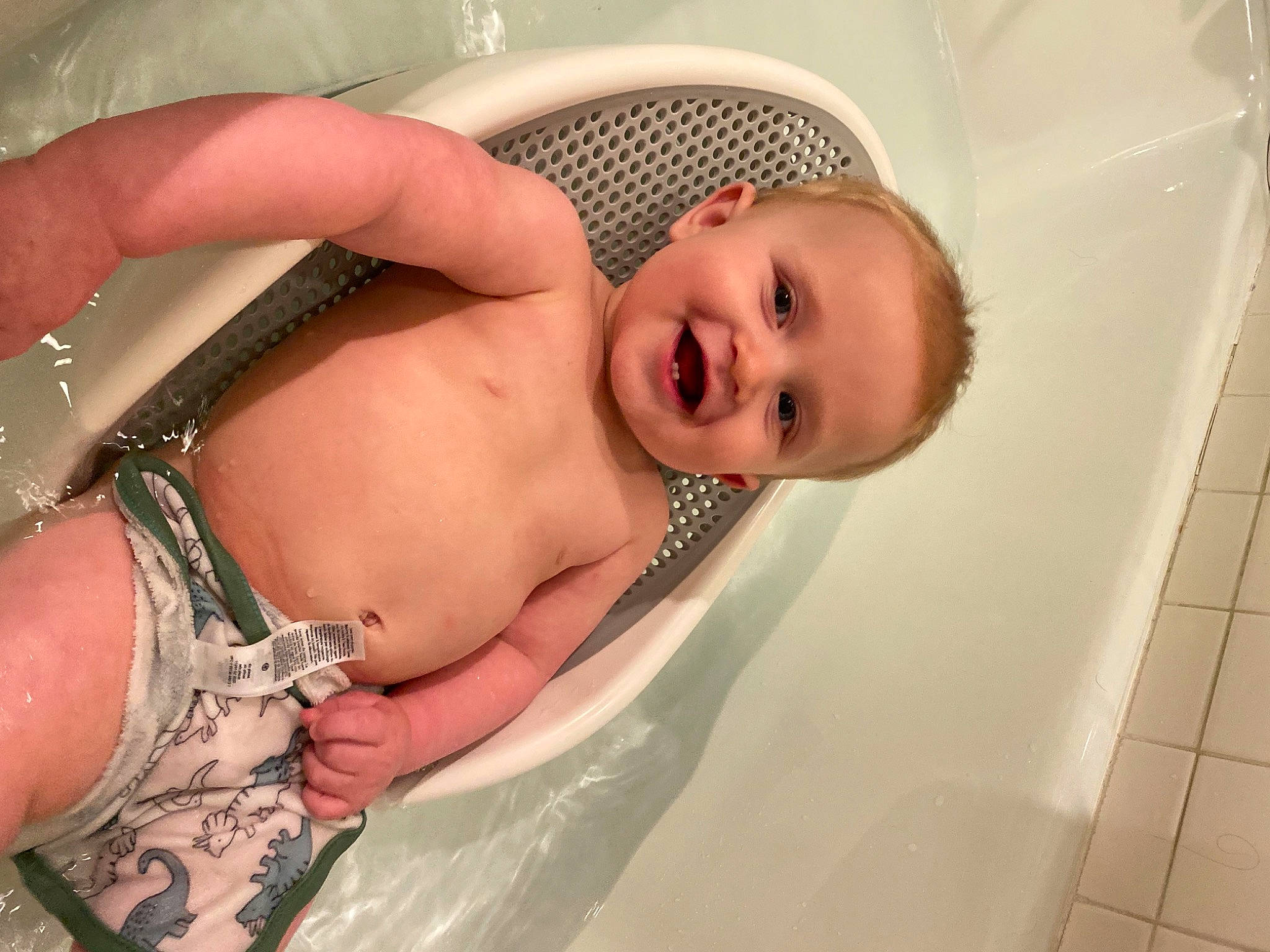 Harrison is registered to the contest to win money with this photo: abdomen, baby, baby_products, bathing, cheek, chest, child, comfort, happy, human_body, jewellery, joy, nail, person, plumbing_fixture, skin, smile, stomach, thigh, thumb