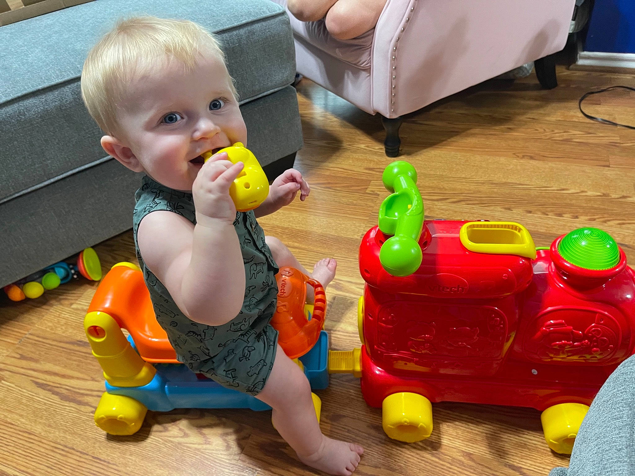 Harrison joined the competition — help win amazing prizes! baby, baby_playing_with_toys, baby_products, baby_toddler_clothing, baby_toys, child, cleanliness, floor, flooring, fun, green, leisure, person, plastic, play, room, sitting, toddler, toy, toy_vehicle