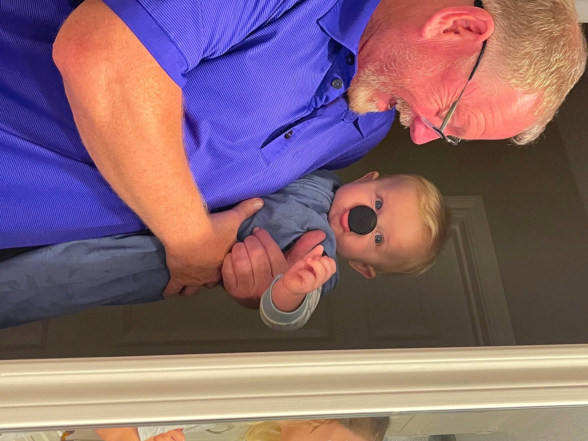 Harrison joined the competition — help win amazing prizes! baby, baby_products, baby_toddler_clothing, baseball_cap, blue, child, comfort, elbow, electric_blue, fun, gesture, hat, mouth, person, room, skin, smile, sunglasses, thumb, toddler