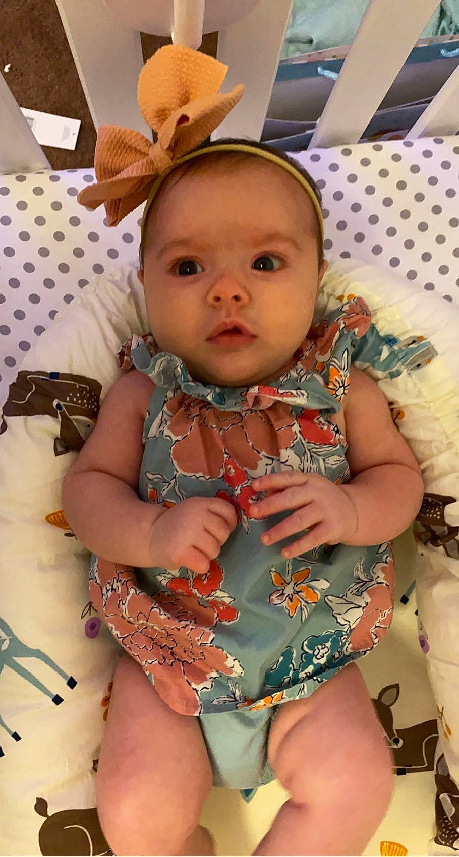 Aurora joined the competition — help win amazing prizes! arm, baby, baby_toddler_clothing, chair, cheek, child, dress, facial_expression, finger, fun, happy, head, human, jewellery, mouth, pattern, person, sitting, skin, thigh