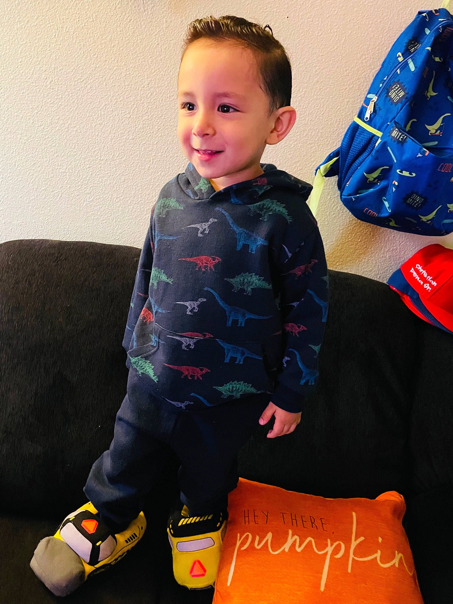 Christian joined the competition — help win amazing prizes! baby_toddler_clothing, child, comfort, electric_blue, flooring, fun, happy, joy, knee, orange, outerwear, pattern, person, product, sitting, sleeve, smile, sock, standing, t_shirt