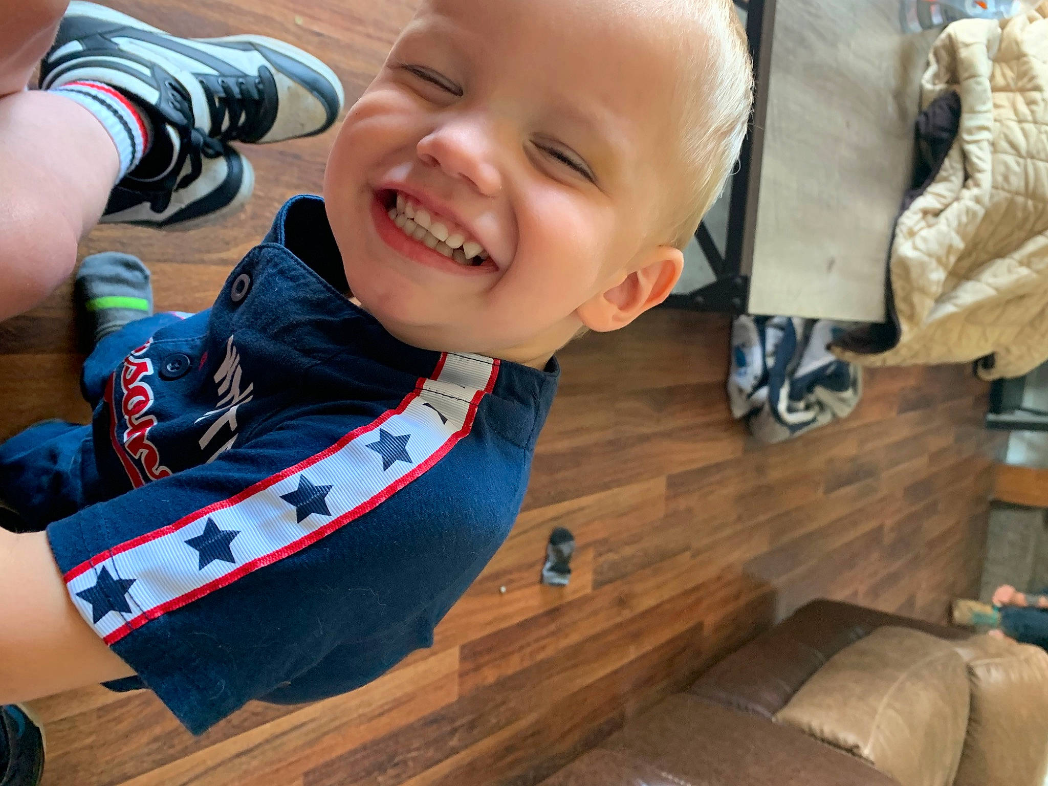 Damon is registered to the contest to win money with this photo: baby, baby_toddler_clothing, carmine, child, elbow, flooring, fun, happy, hardwood, human_leg, joy, knee, leisure, person, play, recreation, sitting, smile, toddler, varnish