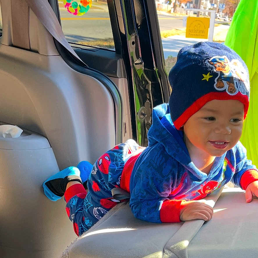 James-Lucas is registered to the contest to win money with this photo: accessories, baby, baseballcap, belt, cap, car, clothing, coat, cushion, face, glove, hat, head, homedecor, jacket, person, photography, portrait, transportation, vehicle