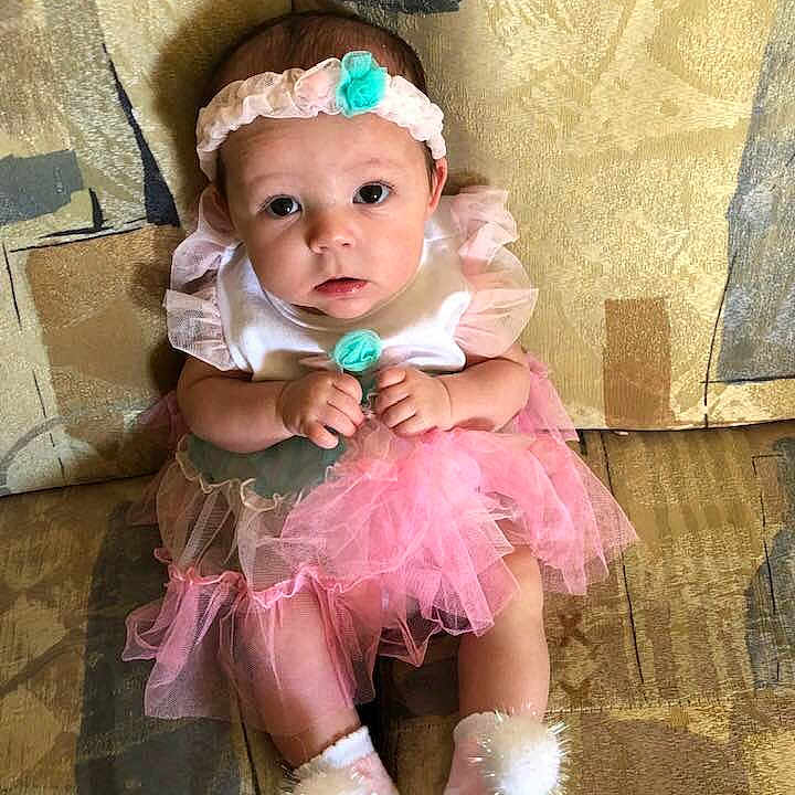 Emmaline joined the competition — help win amazing prizes! baby, baby_products, baby_toddler_clothing, ballet_tutu, child, costume, dress, footwear, hair_accessory, person, pink, product, shoe, smile, toddler