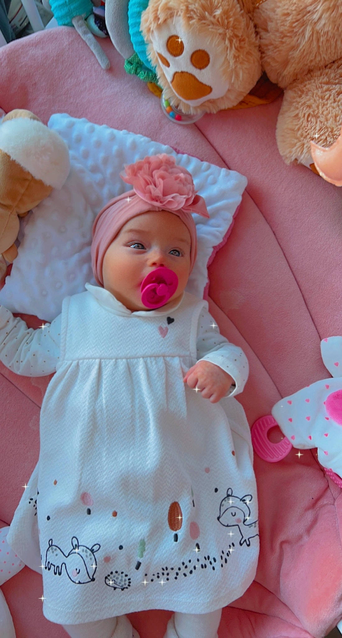 Seyana participe au concours pour gagner de l'argent avec cette photo : baby, baby_toddler_clothing, cheek, clothing, doll, dress, face, head, headgear, headwear, lip, mammal, orange, person, pink, product, skin, sleeve, textile, toddler