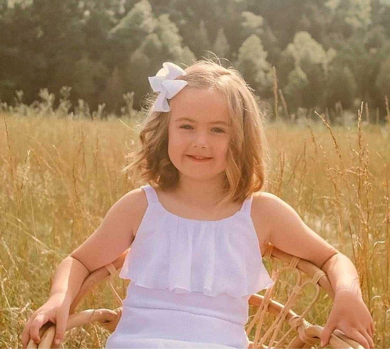 Briella is registered to the contest to win money with this photo: beauty, facial_expression, fawn, flash_photography, fun, grass, grassland, hairstyle, happy, joy, light, long_hair, meadow, morning, people_in_nature, person, photograph, plant, skin, smile