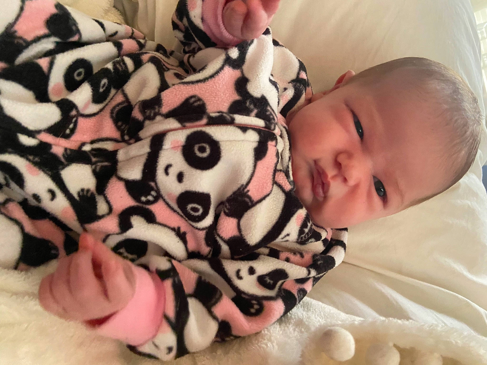 Ella Mae is registered to the contest to win money with this photo: baby, baby_toddler_clothing, carmine, cheek, child, comfort, finger, happy, head, linens, mammal, mouth, nail, pattern, person, pink, skin, sleeve, textile, toddler