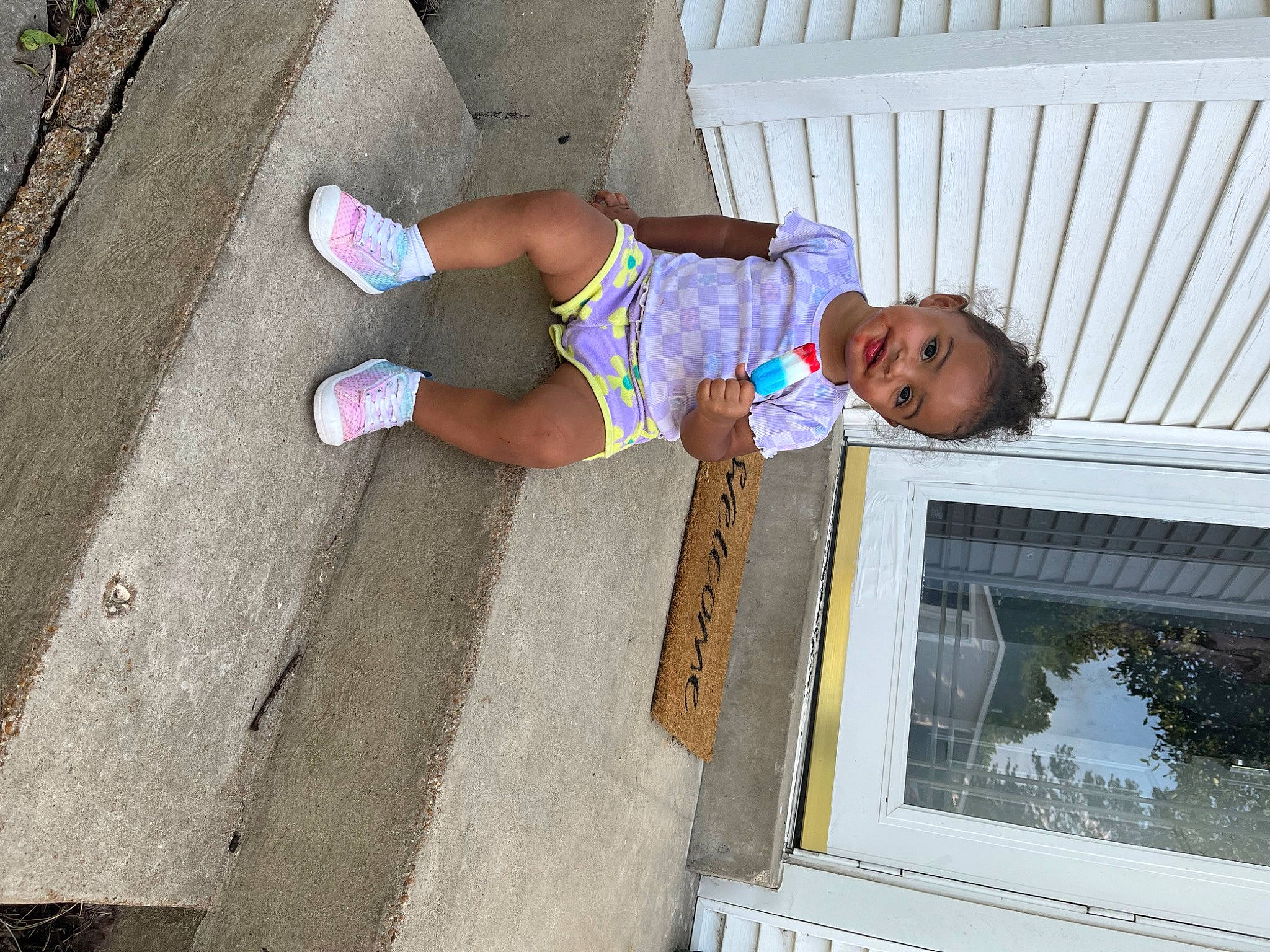 Jadyn joined the competition — help win amazing prizes! baby_toddler_clothing, barefoot, calf, concrete, flip_flops, foot, fun, human_leg, knee, leg, leisure, pattern, person, road_surface, sandal, sidewalk, sock, thigh, toddler, toe