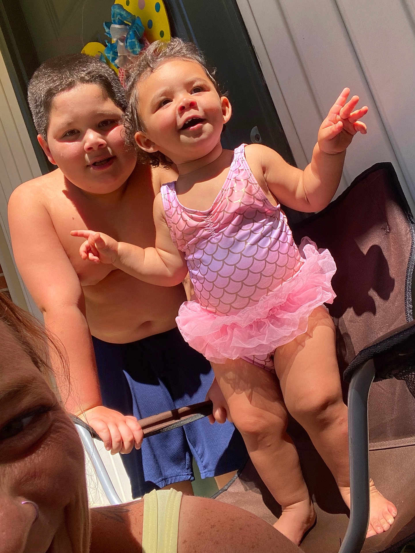 Nevayla joined the competition — help win amazing prizes! blue_shorts, boy, chair, child, children, daylight, face, family, girl, hand, happy, outdoor, pink, playful, skin, smiling, summer, sunlight, swimsuit, toddler