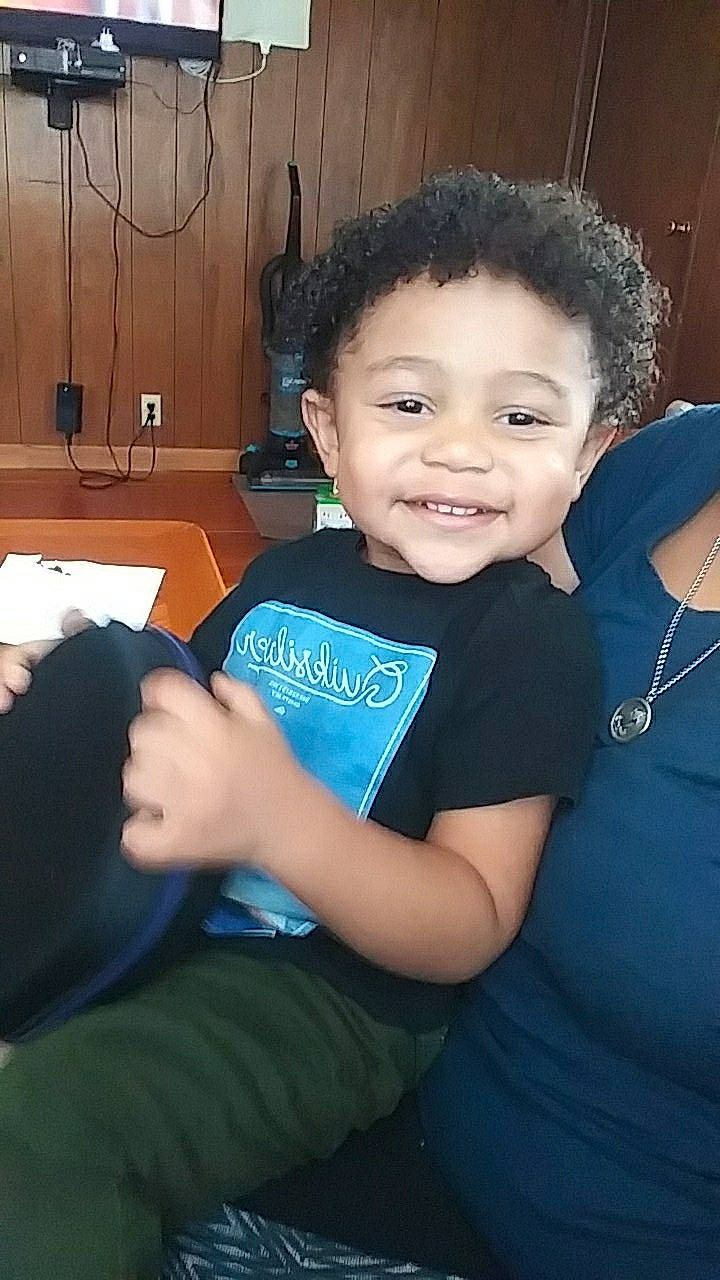 Eric joined the competition — help win amazing prizes! arm, black_hair, child, joy, person, sitting, smile