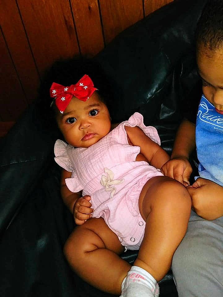 Emiyah joined the competition — help win amazing prizes! arm, baby, cheek, child, eye, finger, fun, hand, head, headgear, headwear, human, leg, lip, people, person, pink, product, sitting, skin