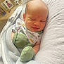 Damian is registered to the contest to win money with this photo: newborn, baby, smiling, blanket, mittens, sleeping, cozy, infant, soft, cute, portrait, indoors, cushion, fabric, bed, resting, person, comfort, head, peaceful