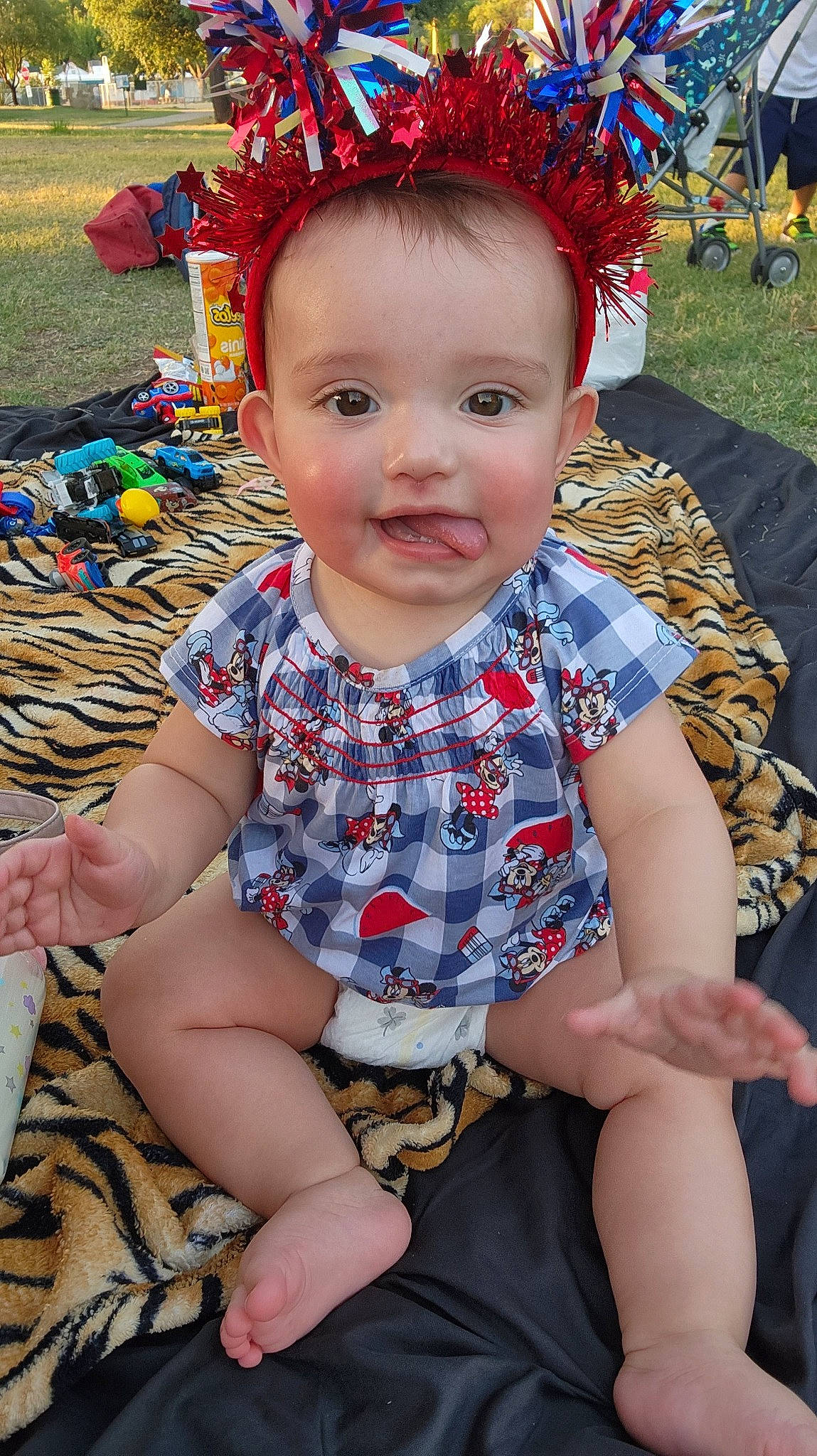 Idalyn joined the competition — help win amazing prizes! baby_toddler_clothing, child, event, facial_expression, fun, grass, happy, human, joy, leisure, organ, pattern, people, person, plaid, plant, recreation, sitting, skin, summer