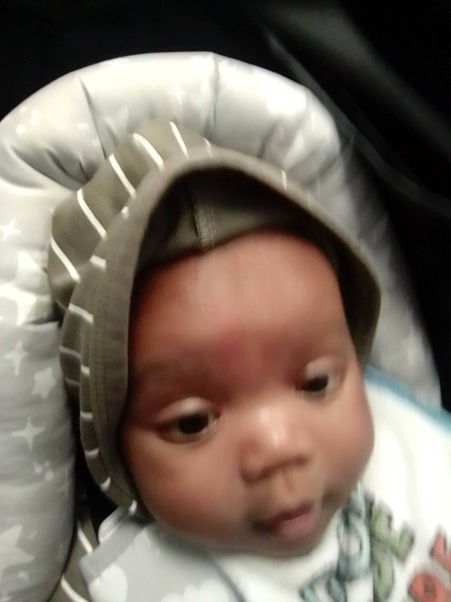 Bajun is registered to the contest to win money with this photo: audio_equipment, baby, black, cap, cheek, child, chin, comfort, eye, eyebrow, eyelash, flash_photography, headgear, headwear, iris, lip, mouth, nose, output_device, person