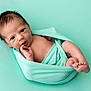 Bear joined the competition — help win amazing prizes! baby, newborn, infant, wrapped, blanket, mint_green, soft, cute, small_hand, barefoot, lying_down, portrait, skin, expression, curious, face, head, young_child, studio, innocence
