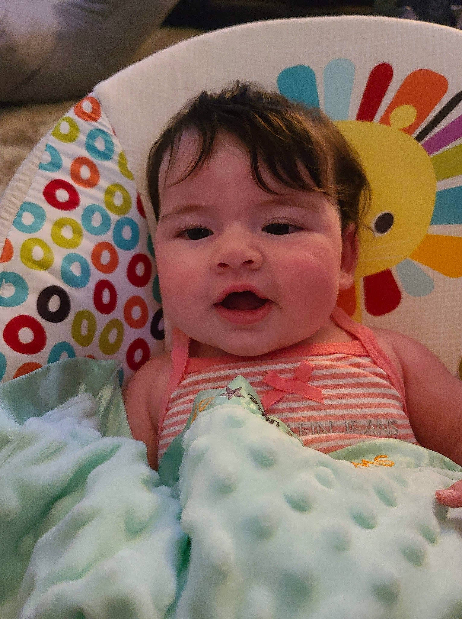 Lilliana is registered to the contest to win money with this photo: baby, bedtime, cheek, child, face, head, linens, lip, mouth, person, skin, smile, textile, toddler