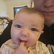 Rayven joined the competition — help win amazing prizes! baby, child, person, face, indoor, curious, close_up, selfie, hand, fingers, adult, background, window, curtain, soft_lighting, floral_clothing, skin, mouth, expression, portrait