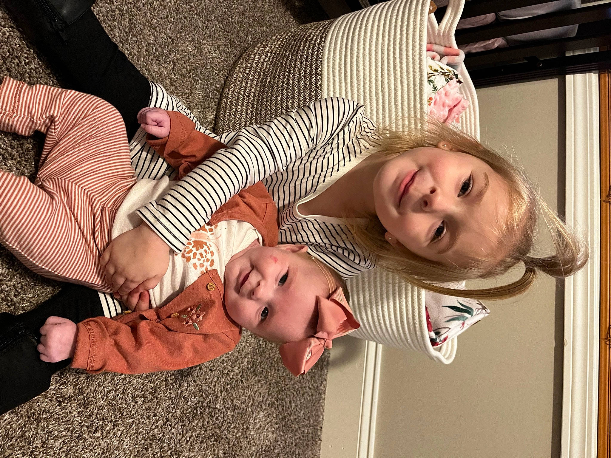 Charleigh-kate is registered to the contest to win money with this photo: baby, baby_toddler_clothing, child, comfort, event, finger, fun, gesture, grass, happy, human_leg, joy, lap, mouth, nail, pattern, person, smile, thigh, thumb