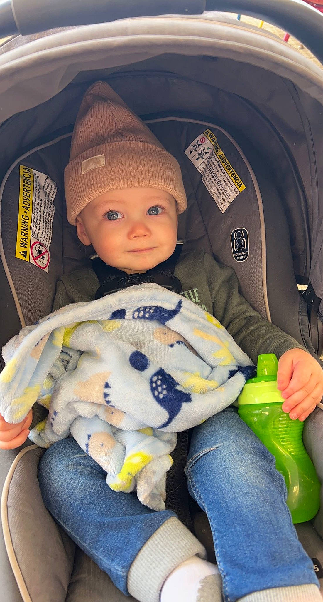 Ace is registered to the contest to win money with this photo: auto_part, baby, baby_carriage, baby_in_car_seat, baby_products, baby_toddler_clothing, car_seat, cheek, child, comfort, fun, head, headwear, organ, person, sitting, skin, smile, stuffed_toy, toddler