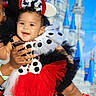 background, blue_sky, castle, celebration, child, costume, cute, dress, face, festive, hand, happy, headband, minnie_mouse, person, polka_dot, portrait, smiling, toddler, tutu