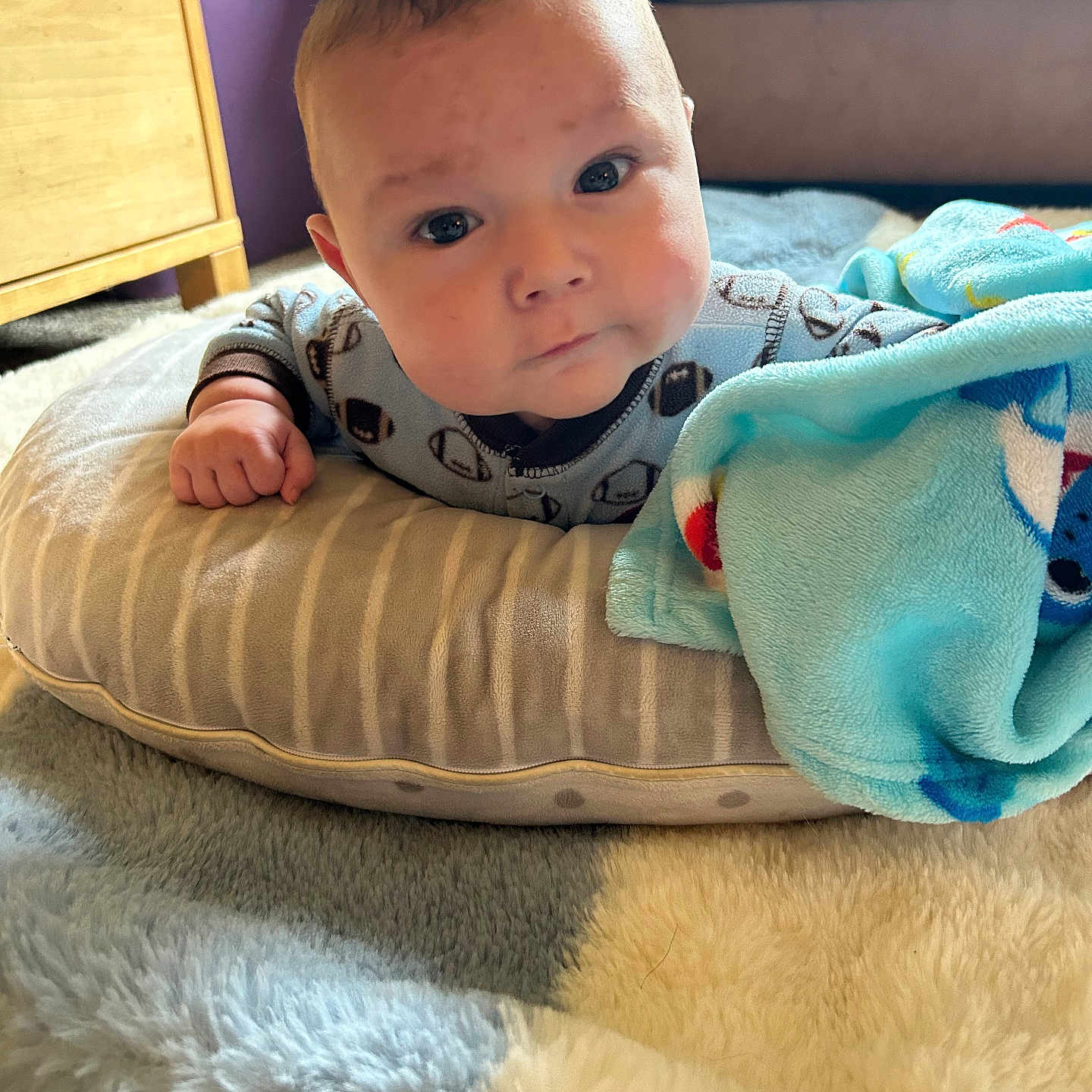 Mason joined the competition — help win amazing prizes! baby, blanket, carpet, child, clothing, couch, cozy, curious, cute, face, floor, furniture, head, indoor, infant, living_room, looking, person, pillow, soft_texture