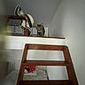Virgule a rejoint le concours — aidez-le/la à gagner de superbes lots ! cat, tabby_cat, loft, wooden_ladder, hat, striped_hat, bed, pillow, minnie_mouse_plush, polka_dot, railing, indoor, wall, ceiling, furniture, cozy, curious, pet, home, room