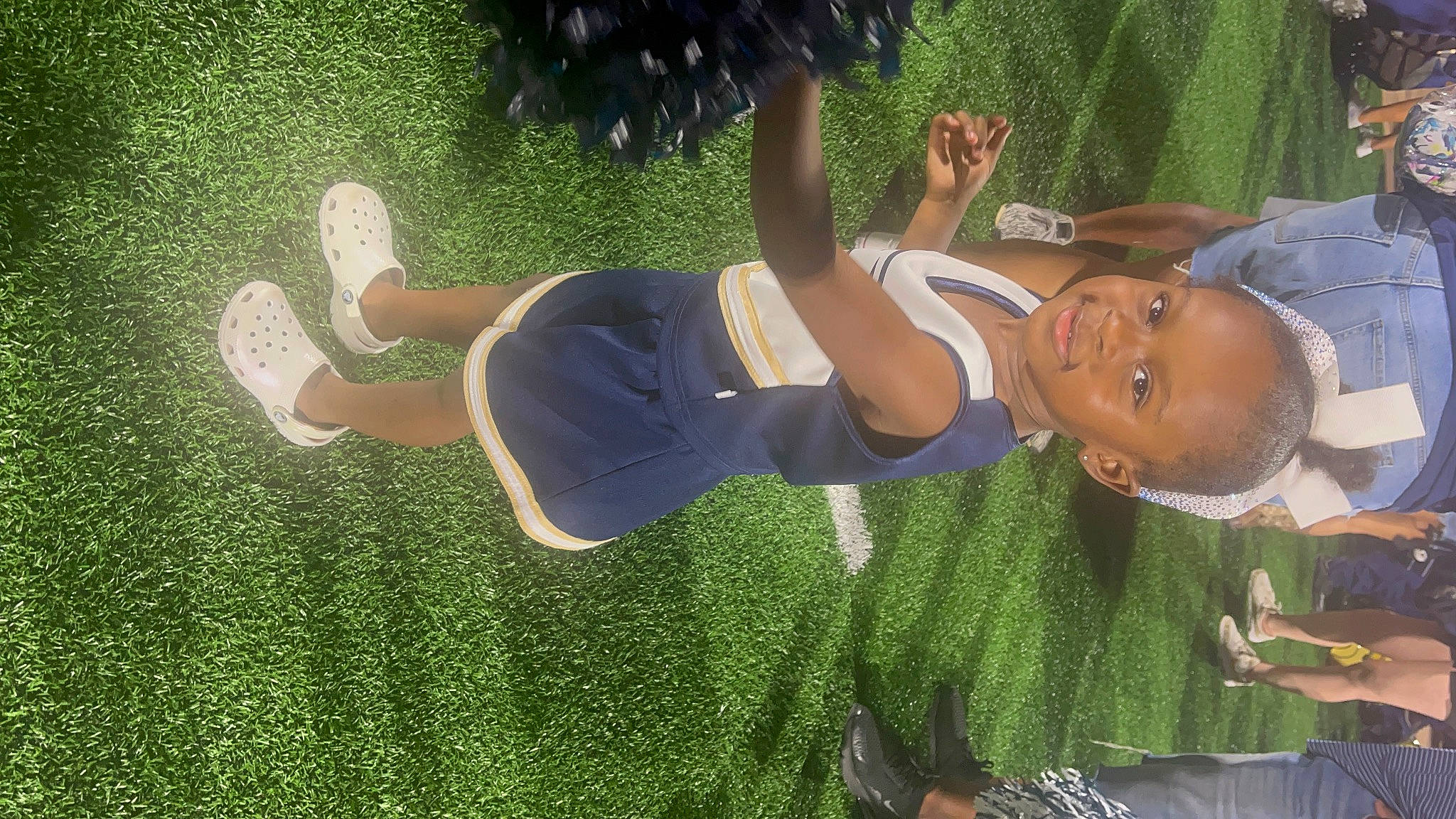 Madeline joined the competition — help win amazing prizes! black_hair, cool, fun, gesture, grass, grass_family, green, happy, hat, human_leg, joint, joy, knee, lawn, leisure, people_in_nature, person, plant, recreation, smile