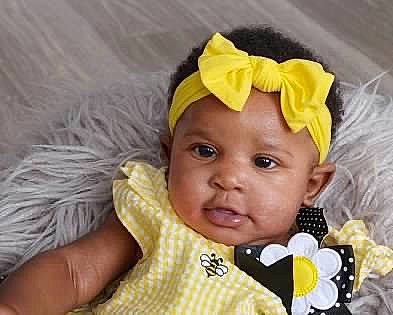 Wynter is registered to the contest to win money with this photo: baby, baby_products, baby_toddler_clothing, cheek, child, costume_hat, eye, eyelash, fashion_accessory, happy, hat, head, headpiece, headwear, iris, nose, outerwear, person, skin, sleeve