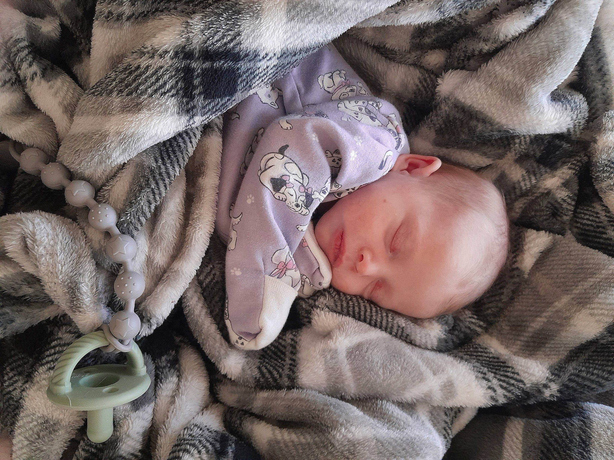 Pazlee is registered to the contest to win money with this photo: baby, baby_products, baby_toddler_clothing, child, comfort, fashion_accessory, fur, linens, nap, pattern, person, portrait_photography, product, skin, sleep, textile, thread, toddler, wood