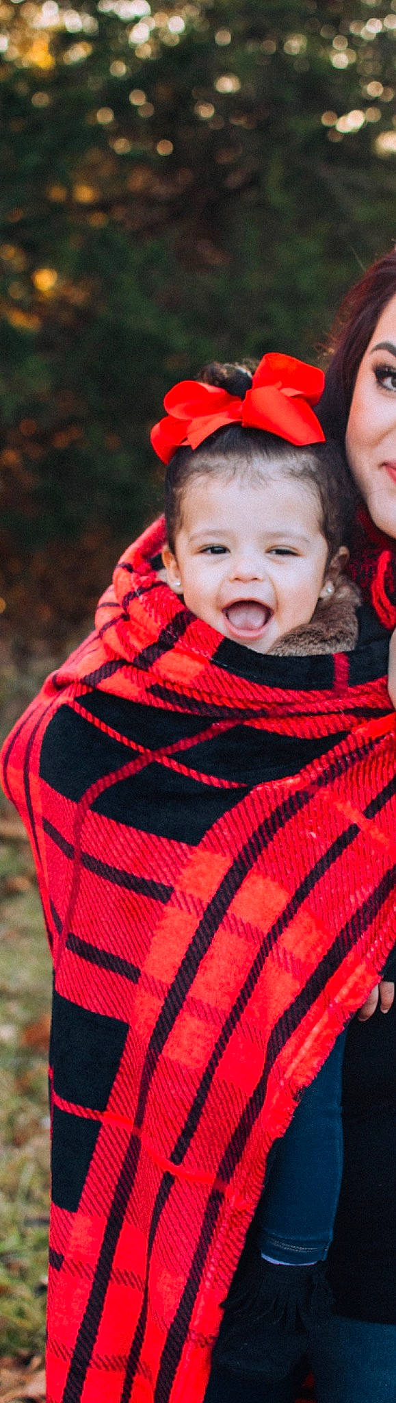 Nova Rose joined the competition — help win amazing prizes! baby, child, costume, design, headgear, neck, outerwear, pattern, person, plaid, red, smile, tartan, textile, toddler, wool