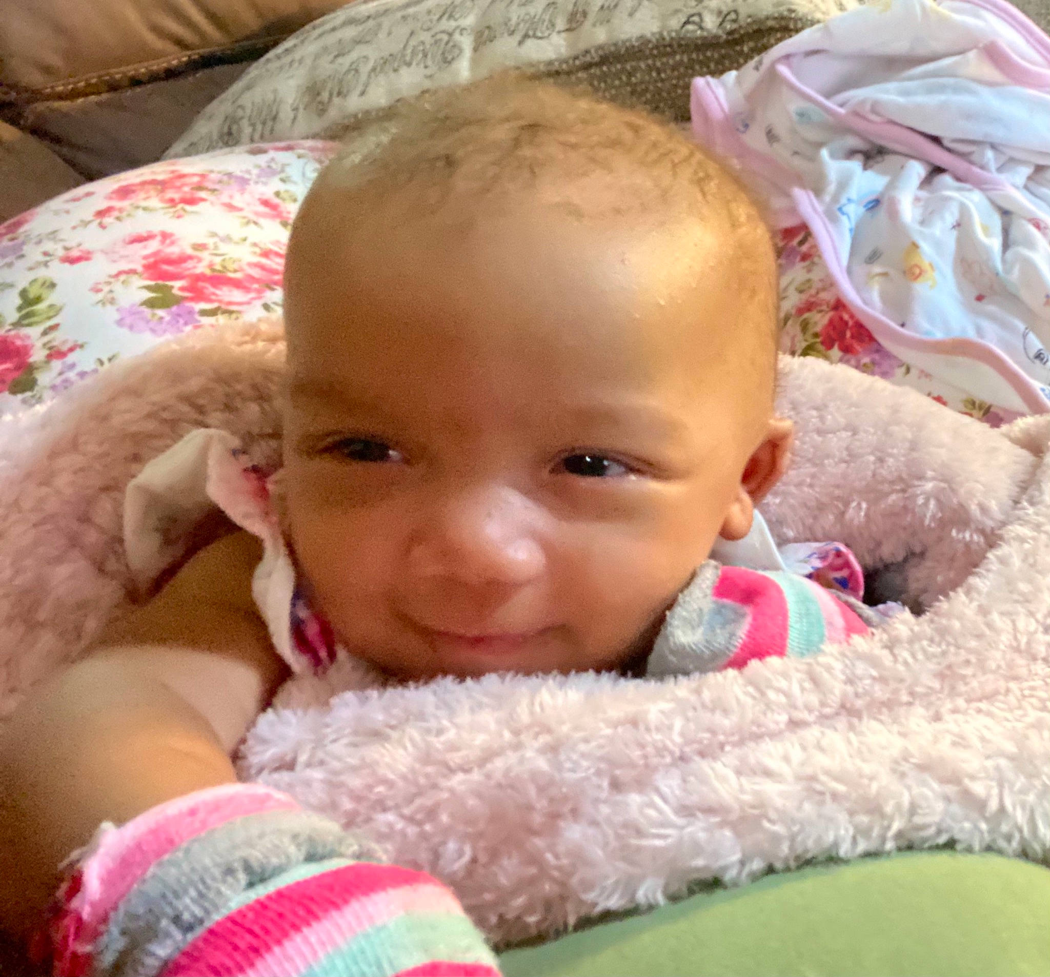Myleigh is registered to the contest to win money with this photo: baby, baby_products, baby_toddler_clothing, cheek, child, comfort, eye, home_accessories, linens, lip, mouth, nose, person, pink, plastic_bag, skin, textile, thread, toddler, wool