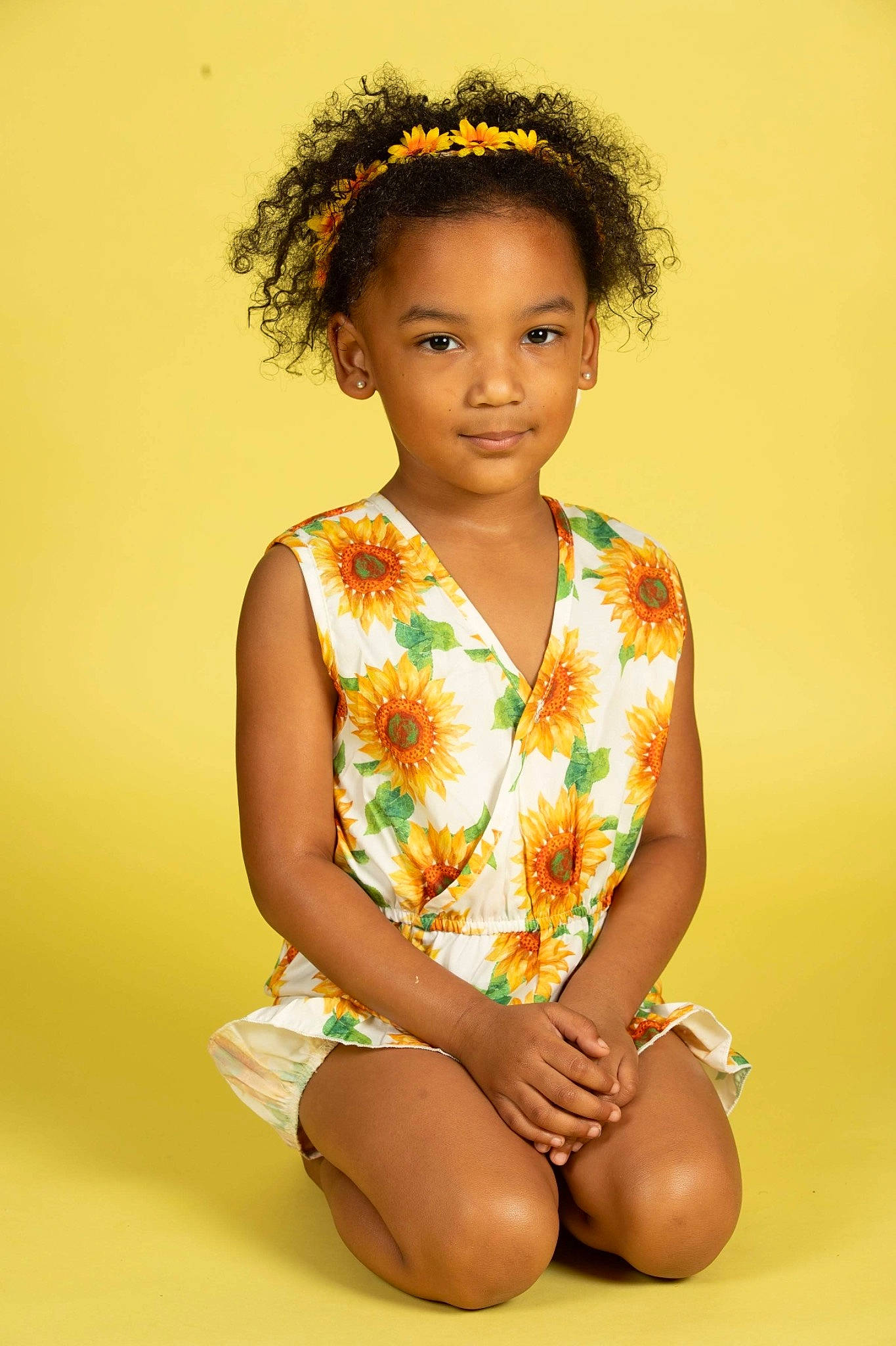 Tru is registered to the contest to win money with this photo: abdomen, afro, barefoot, beauty, black_hair, chest, child_model, elbow, foot, hand, human_body, human_leg, jheri_curl, joint, joy, knee, person, ringlet, sitting, skin