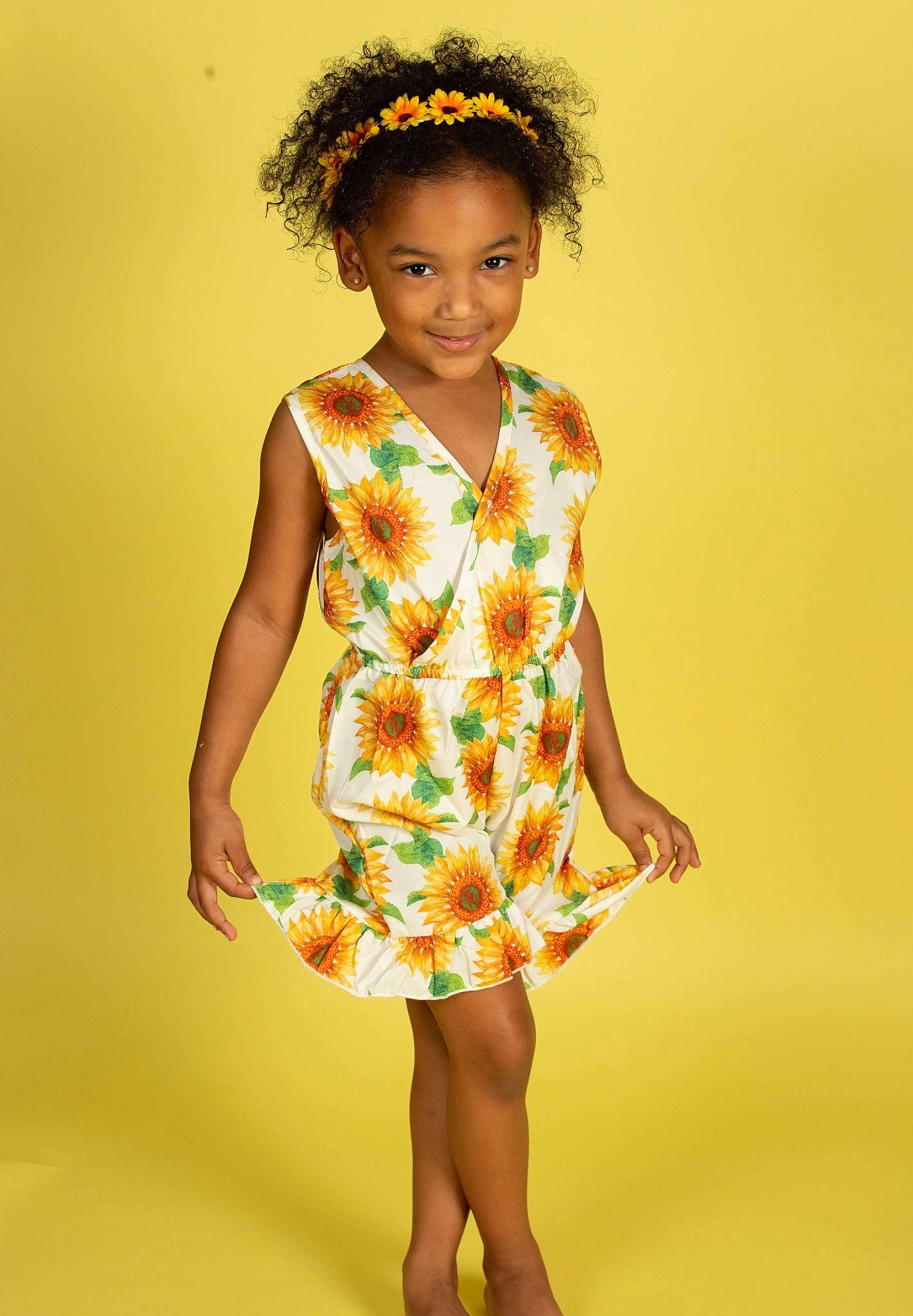 Tru is registered to the contest to win money with this photo: afro, calf, child_model, day_dress, dress, fashion, finger, foot, human_body, human_leg, jheri_curl, joint, joy, knee, one_piece_garment, pattern, person, shoulder, skin, standing