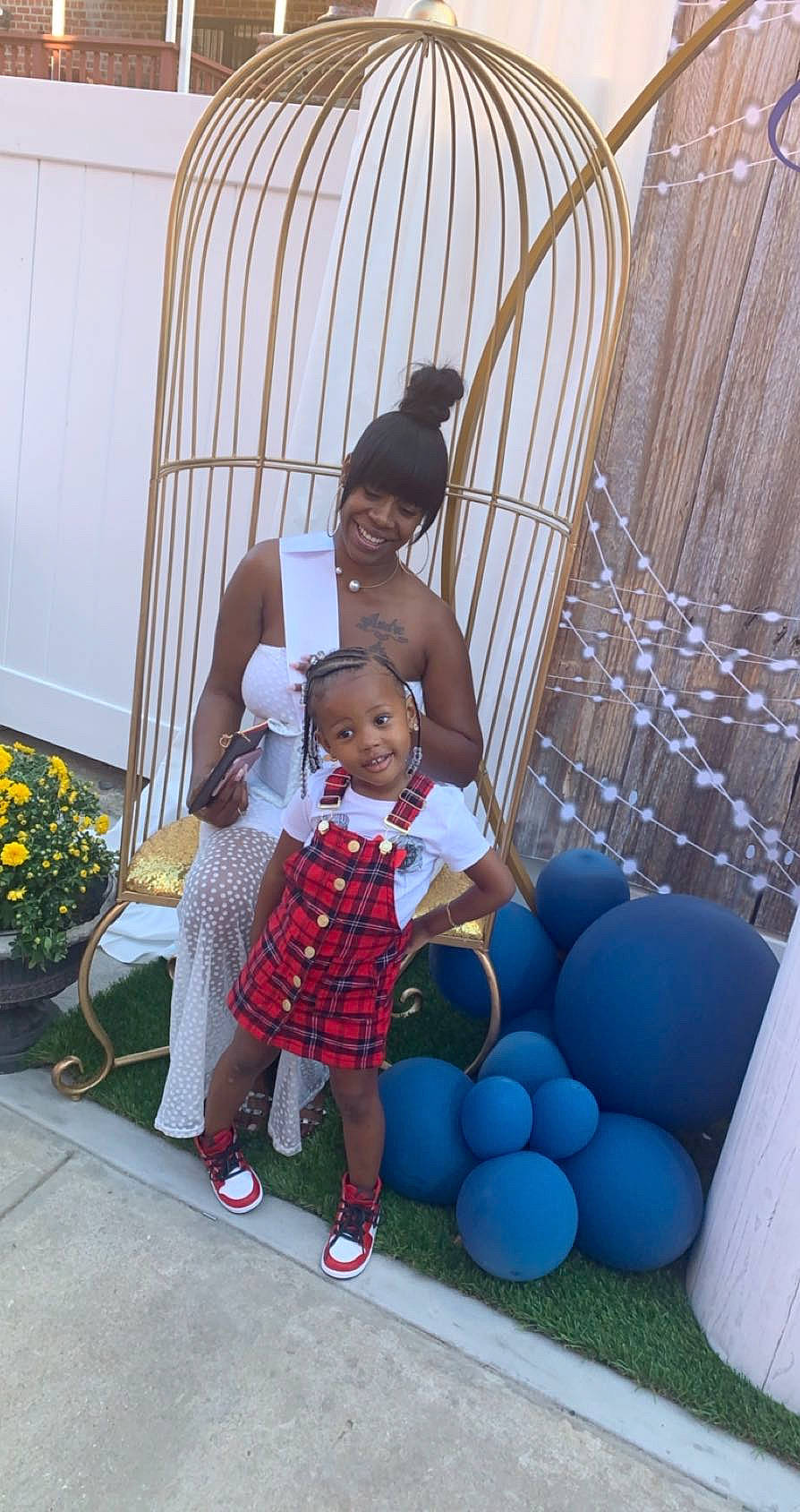 Malaysia is registered to the contest to win money with this photo: balloon, child, event, flower, flowerpot, fun, happy, human_body, joy, leisure, party_supply, people, person, plant, recreation, sandal, sitting, t_shirt, toddler, toy