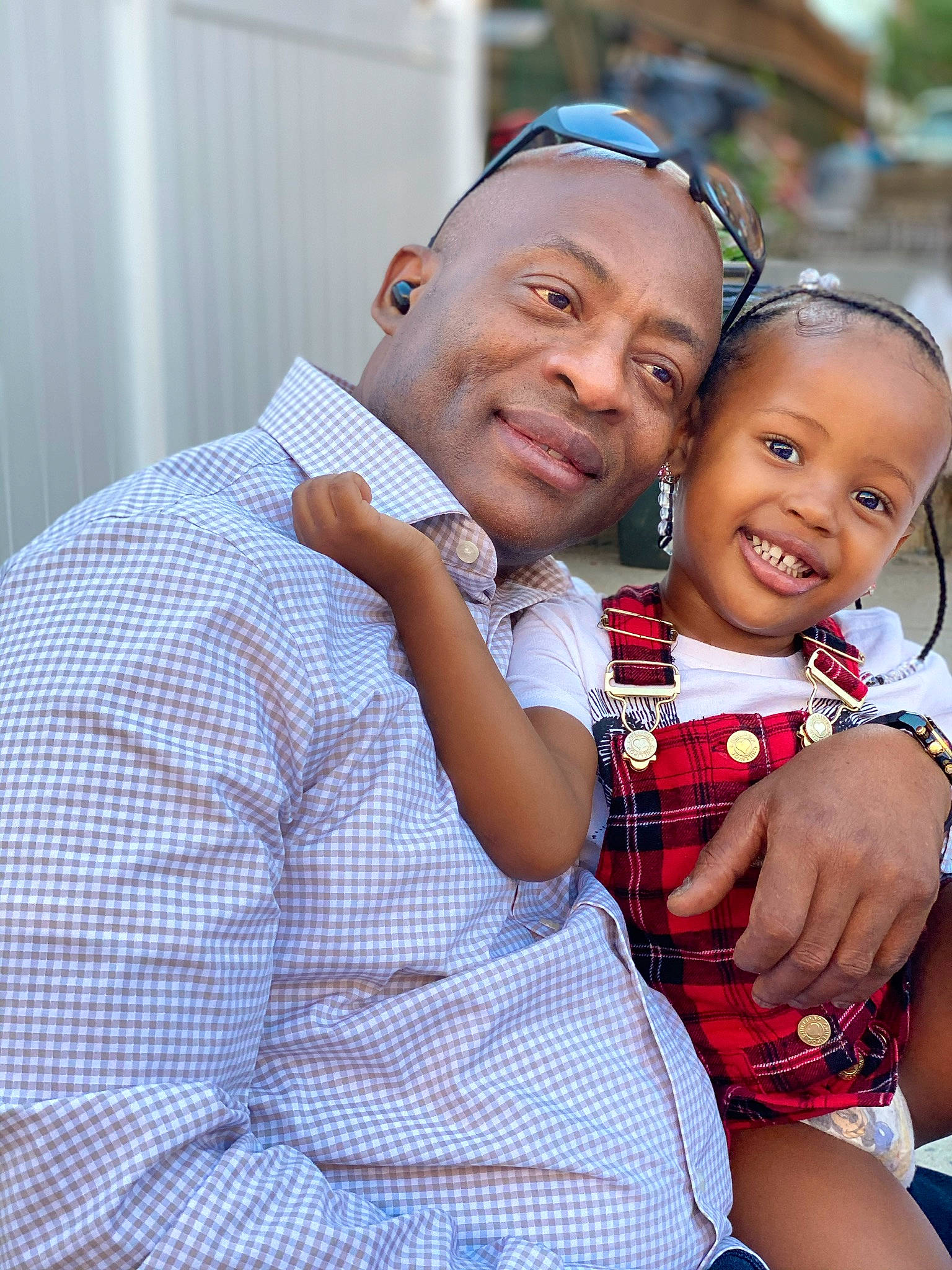 Malaysia is registered to the contest to win money with this photo: baby_toddler_clothing, blue, child, dress, dress_shirt, event, flash_photography, fun, gesture, hand, happy, joy, pattern, person, plaid, shoulder, sitting, skin, smile, tartan