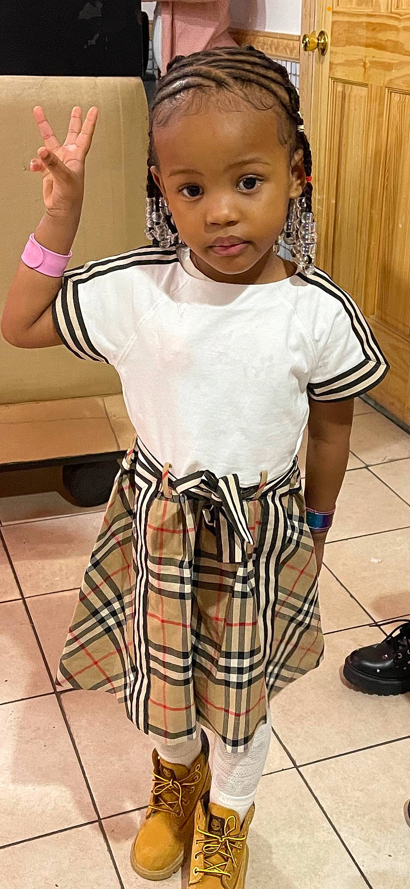 Malaysia joined the competition — help win amazing prizes! baby_toddler_clothing, black, cheek, child, eyelash, face, fashion_design, gesture, happy, head, neck, pattern, people, person, plaid, skin, sleeve, street_fashion, tartan, toddler