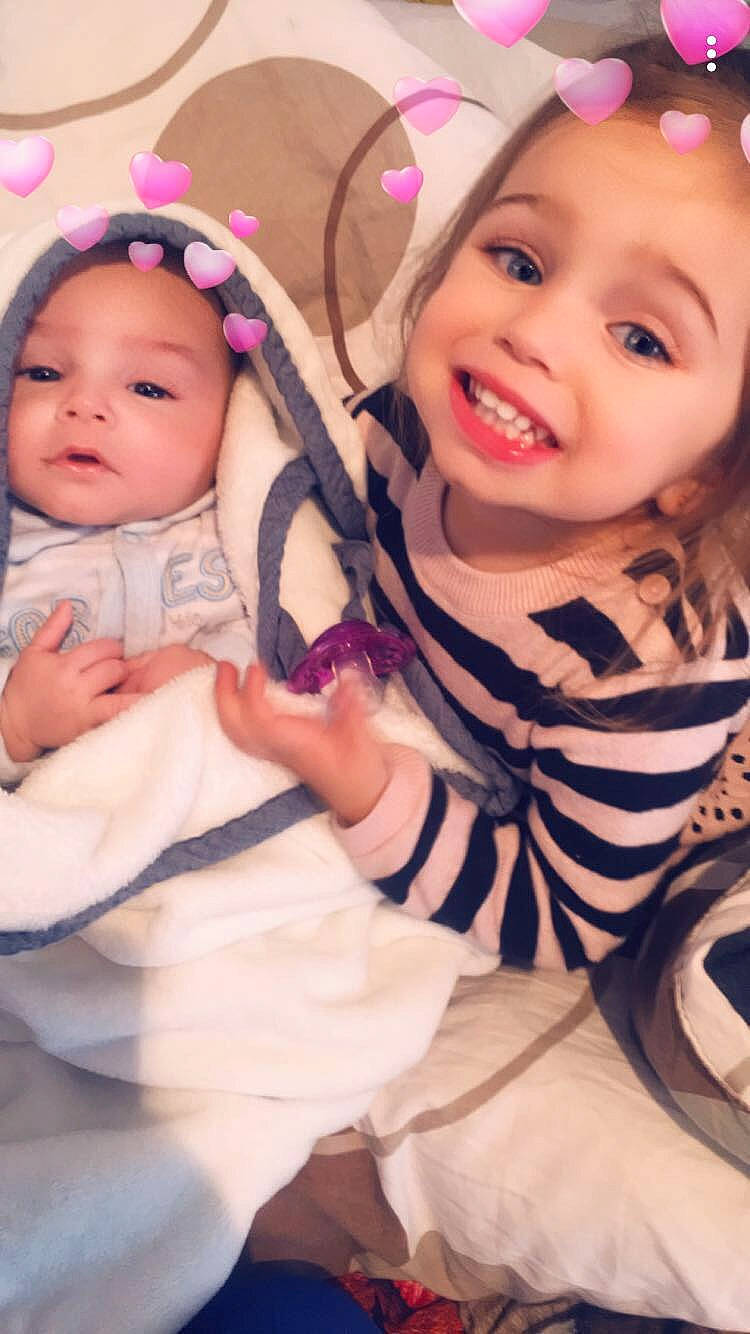 Kess a rejoint le concours — aidez-le/la à gagner de superbes lots ! baby, baby_products, baby_toddler_clothing, cheek, child, eye, eyelash, face, facial_expression, happy, headwear, iris, joy, lip, magenta, mouth, nose, person, pink, purple