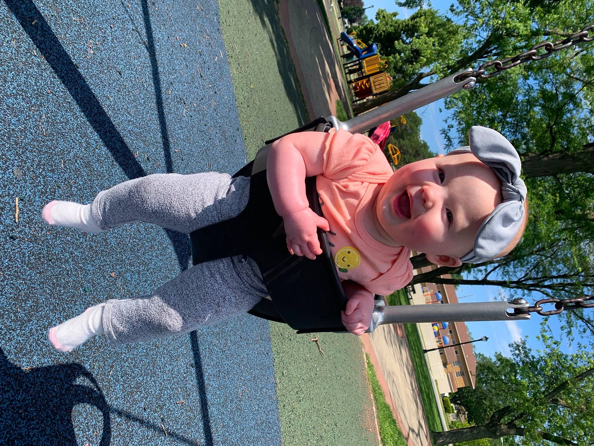 Kendall joined the competition — help win amazing prizes! adventure, asphalt, child, fun, grass, happy, hat, headwear, leisure, outdoor_play_equipment, person, plant, recreation, road_surface, sky, smile, toddler, tree, vacation, walking_shoe