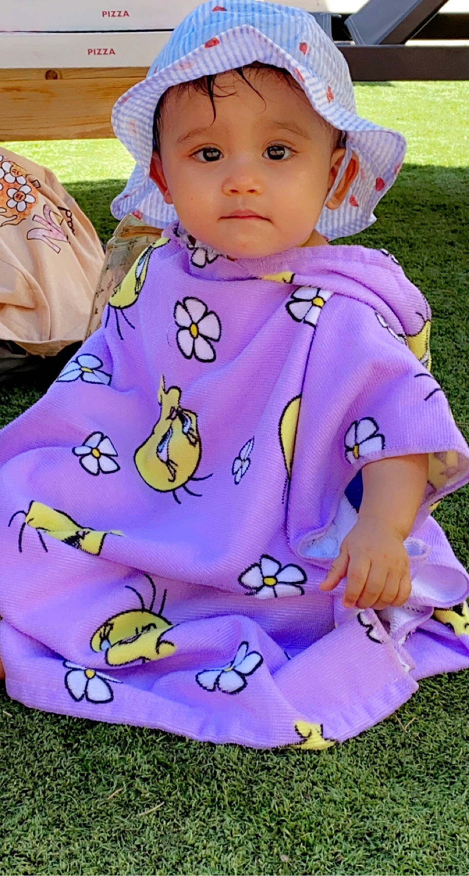 Aaliyah a rejoint le concours — aidez-le/la à gagner de superbes lots ! baby, baby_products, baby_toddler_clothing, child, dress, eye, grass, green, happy, head, headwear, jacket, magenta, pattern, person, pink, purple, sleeve, textile, toddler