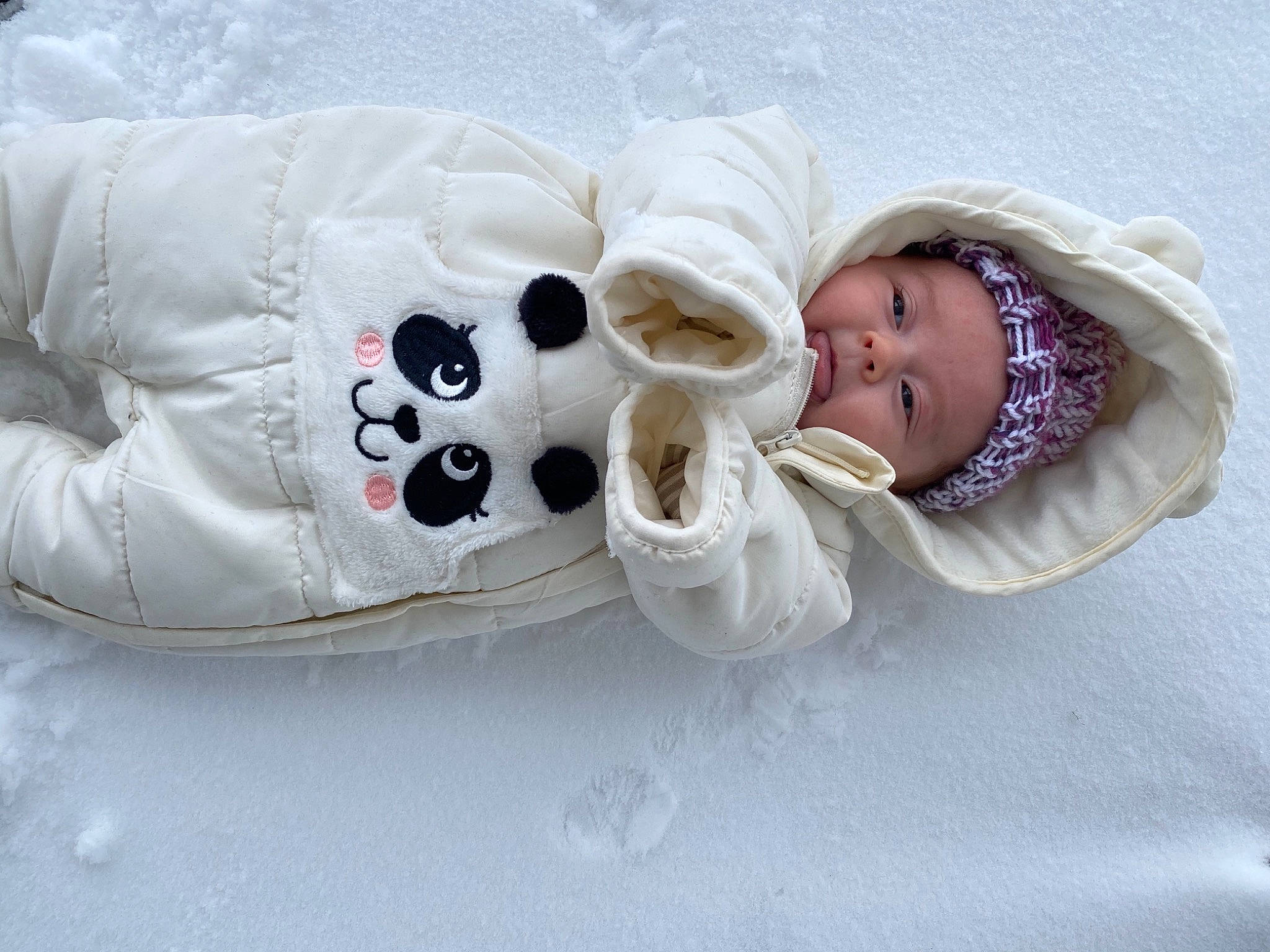 Brylee joined the competition — help win amazing prizes! baby, baby_safety, baby_sleeping, baby_toddler_clothing, bedding, carmine, child, comfort, freezing, fur, happy, head, headgear, headwear, linens, person, room, sleeve, smile, snow