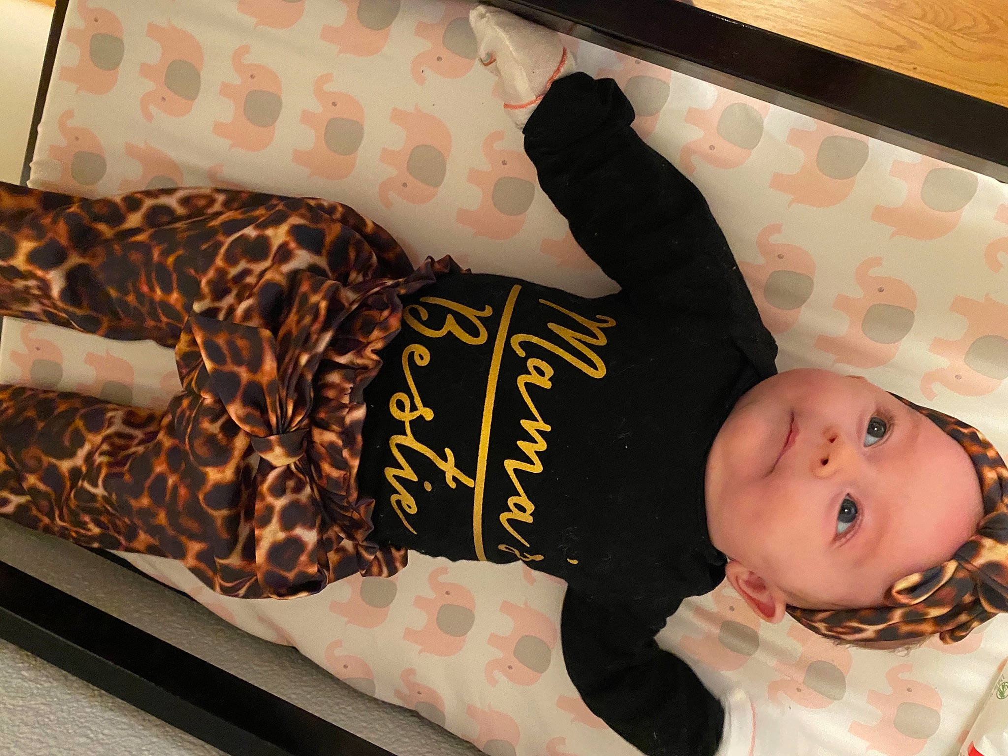 Brylee is registered to the contest to win money with this photo: baby, baby_products, baby_safety, baby_toddler_clothing, child, comfort, elbow, fashion_accessory, headgear, human_leg, knee, linens, mammal, pattern, person, room, sleeve, smile, thigh, toddler