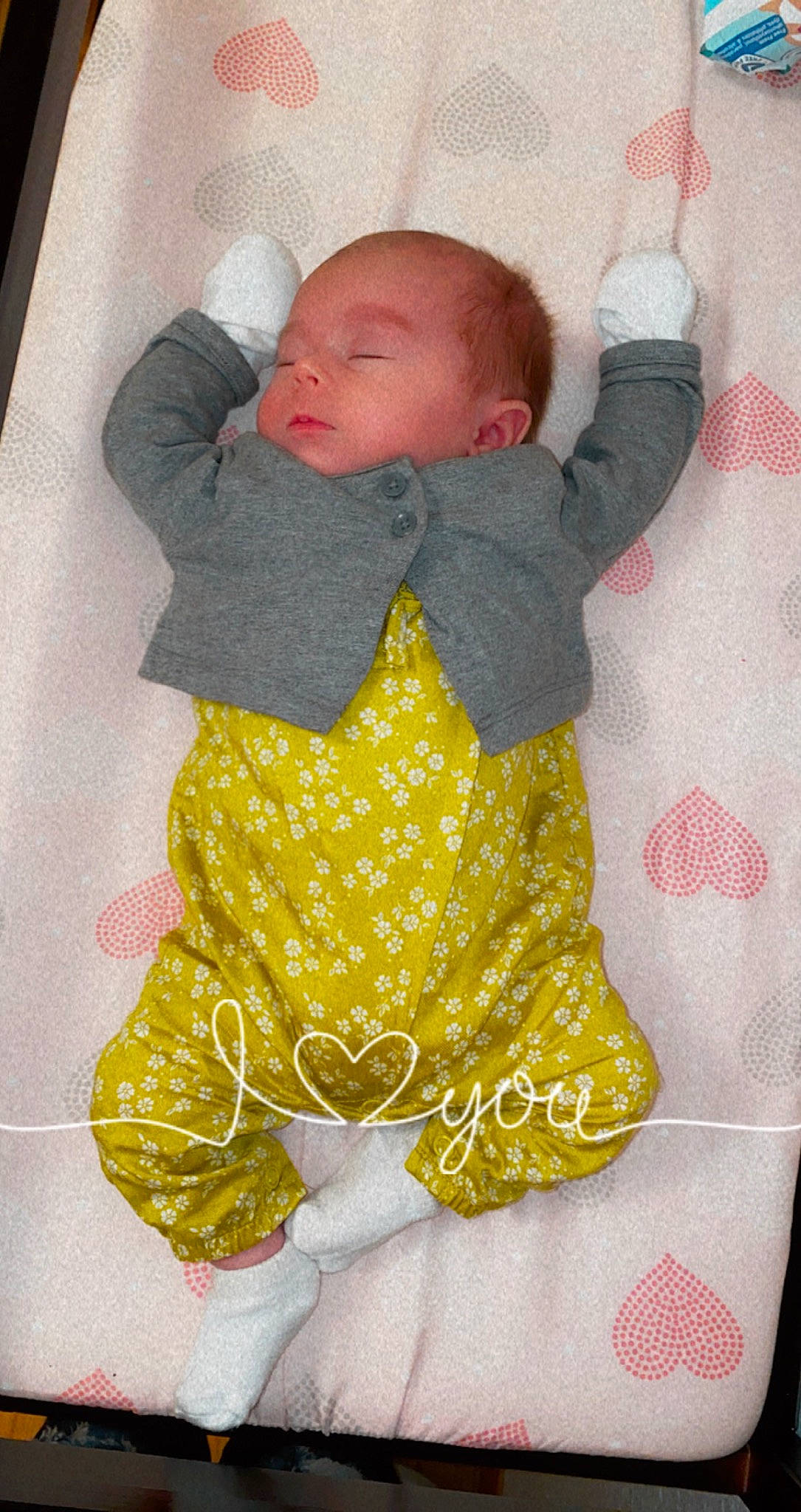 Brylee is registered to the contest to win money with this photo: baby, baby_products, baby_safety, baby_sleeping, baby_toddler_clothing, baby_toys, cheek, child, comfort, face, linens, one_piece_garment, pattern, person, pink, room, sitting, sleeve, sock, textile