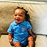 Johnathan is registered to the contest to win money with this photo: baby, child, smiling, blue_outfit, sitting, couch, indoor, footwear, happy, person, infant, young_child, clothing, shoes, hairstyle, cute, portrait, skin, face, home