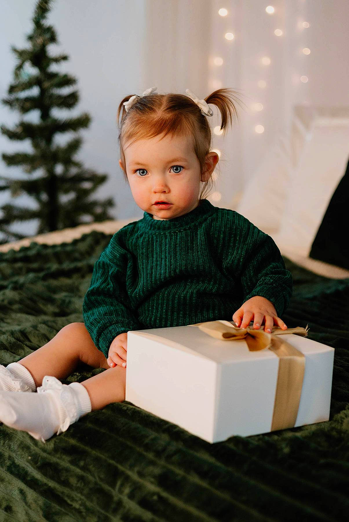 Aubriel joined the competition — help win amazing prizes! beauty, box, child, conifer, fir, flooring, fun, grass, happy, paper_product, pattern, person, play, portrait_photography, recreation, sitting, sleeve, standing, toddler, tree