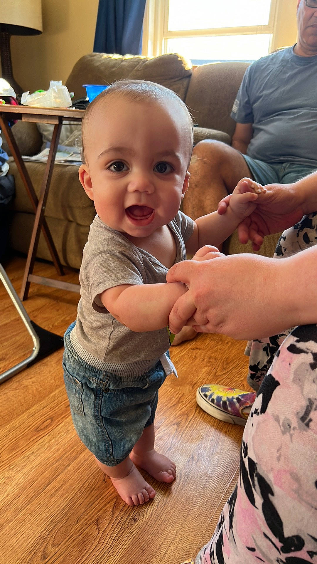 Johnathan joined the competition — help win amazing prizes! baby, baby_toddler_clothing, child, event, finger, flooring, foot, fun, gesture, hardwood, joint, person, sharing, skin, smile, t_shirt, thumb, toddler, varnish, wood