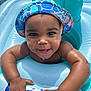 arms, baby, child, cute, face, float, fun, happy, hat, infant, outdoor, playful, pool, skin, smiling, splash, summer, sunlight, vacation, water