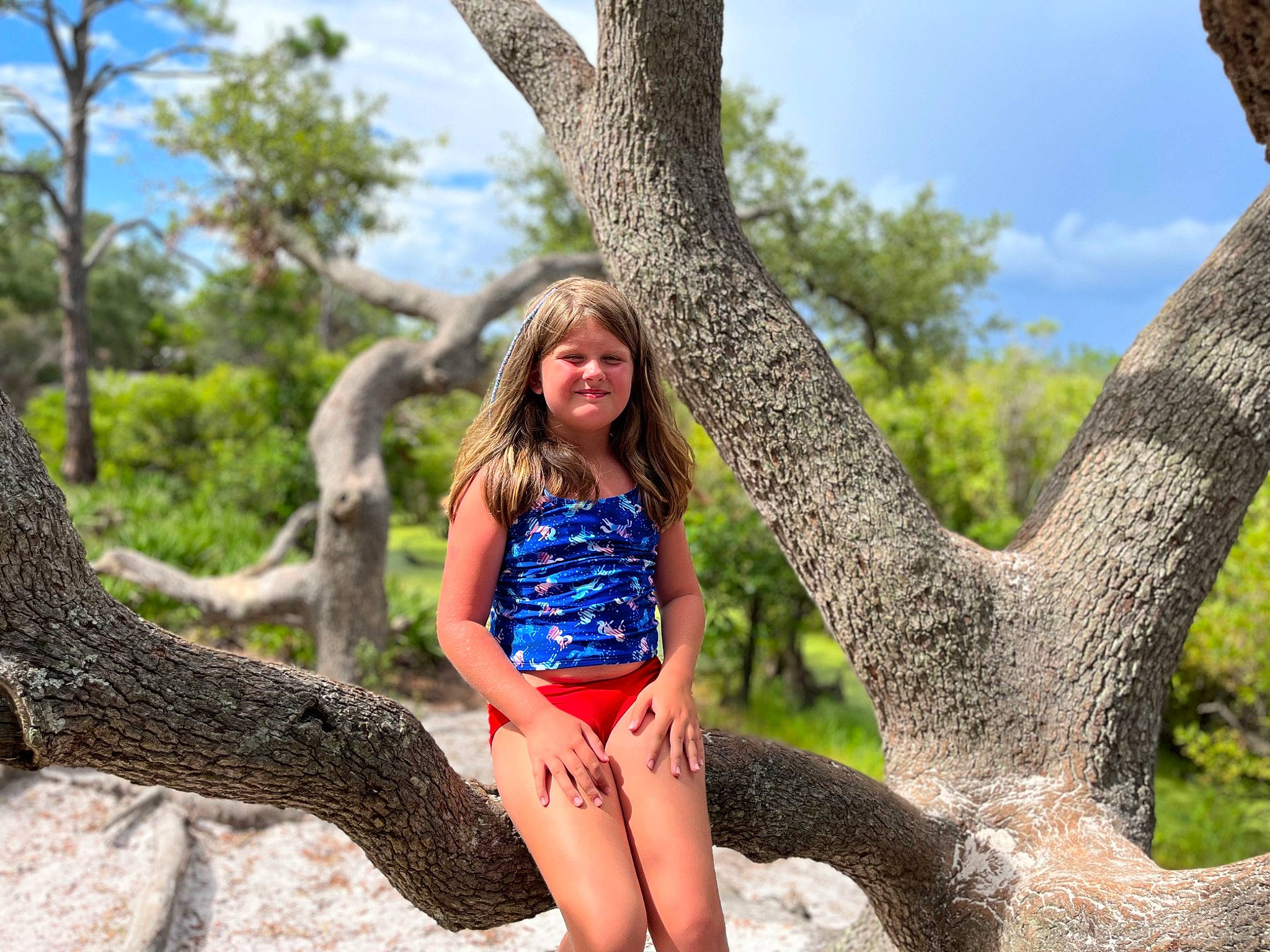 Kiley joined the competition — help win amazing prizes! black_hair, botany, branch, cloud, fawn, grass, hairstyle, happy, joy, leg, leisure, people_in_nature, person, plant, sky, sunglasses, thigh, tree, trunk, waist