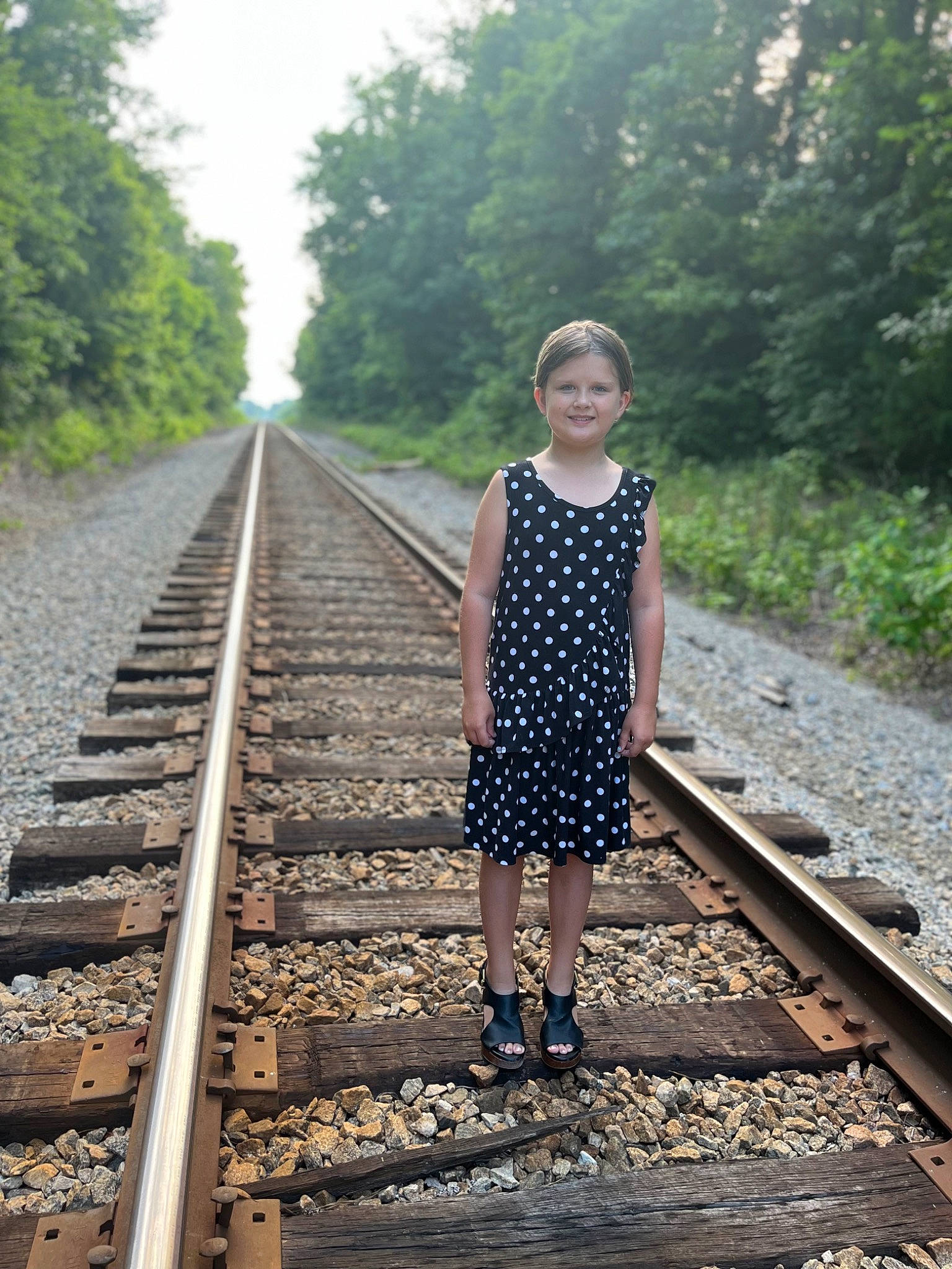 Kiley joined the competition — help win amazing prizes! dress, footwear, hair, joy, leaf, leg, line, morning, nature, people_in_nature, person, plant, railway, shoe, sky, thigh, thoroughfare, track, travel, tree