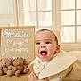 baby, infant, smiling, portrait, teddy_bear, birthday, letter_board, indoor, soft_light, cute, child, hat, clothing, fabric, face, happy, baby_boy, toy, crawling, expression
