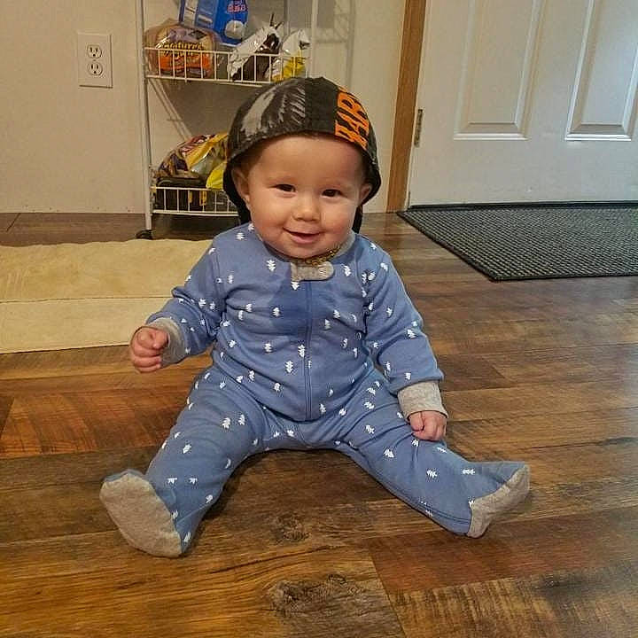 Brennan joined the competition — help win amazing prizes! baby, baby_toddler_clothing, child, crawling, floor, flooring, head, joy, outerwear, pajamas, person, play, shoe, sitting, sleeve, standing, toddler, wood, wood_flooring